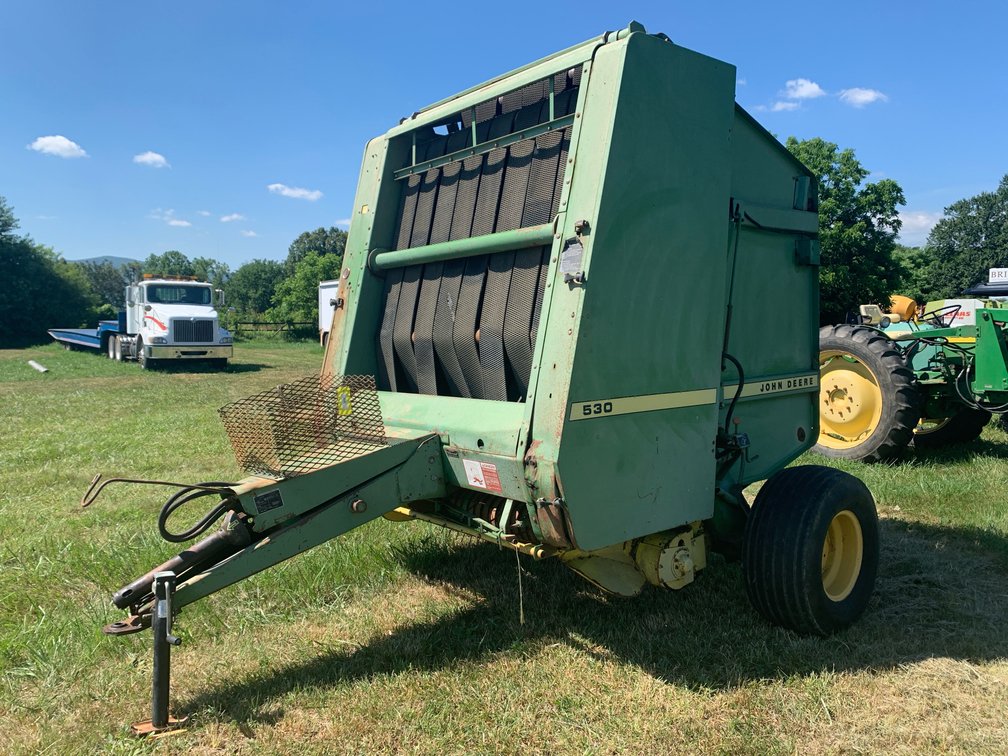 1987 Model John Deere 530 String Round Baler. Makes 5x6 Bales. Has Control Box and Drive Shaft. Everything Works But Needs One Spring Replaced