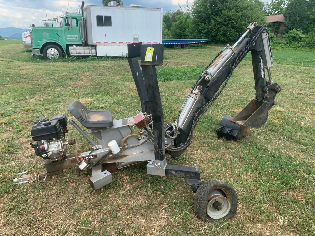 Tow Behind Back Hoe. Needs A Hydraulic Pump