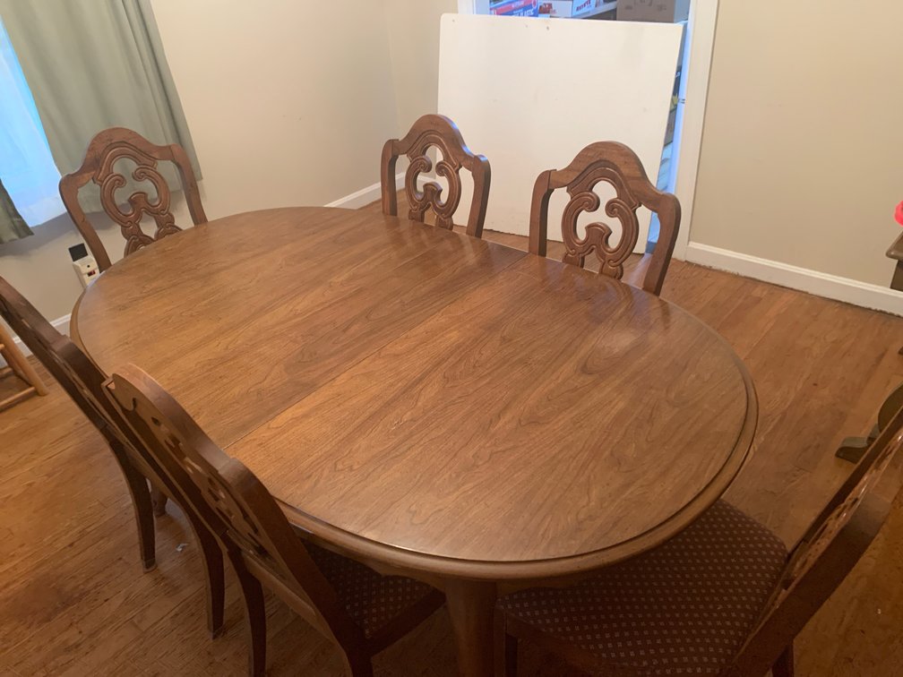 Oval Wood Dining Table and Six Upholstered Chairs