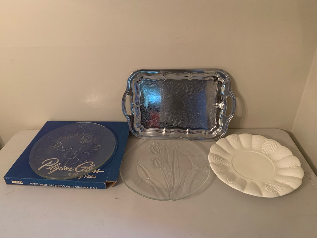 Glass Platters, Metal Serving Tray, and Ceramic Plate