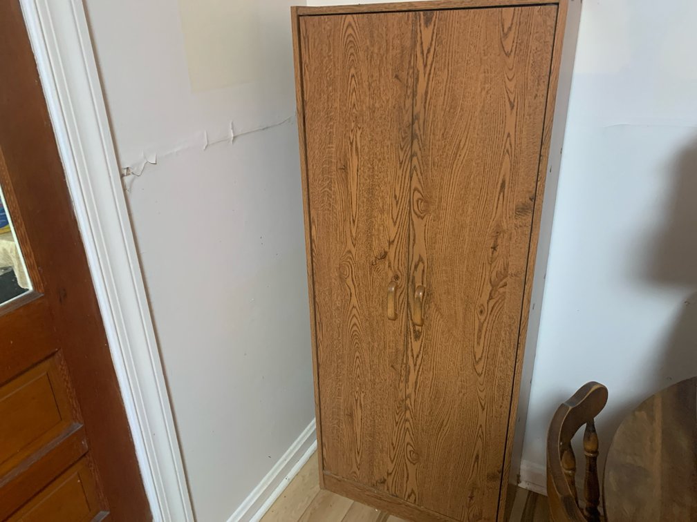 Tall Two-Door Oak Wood-Grain Storage Cabinet