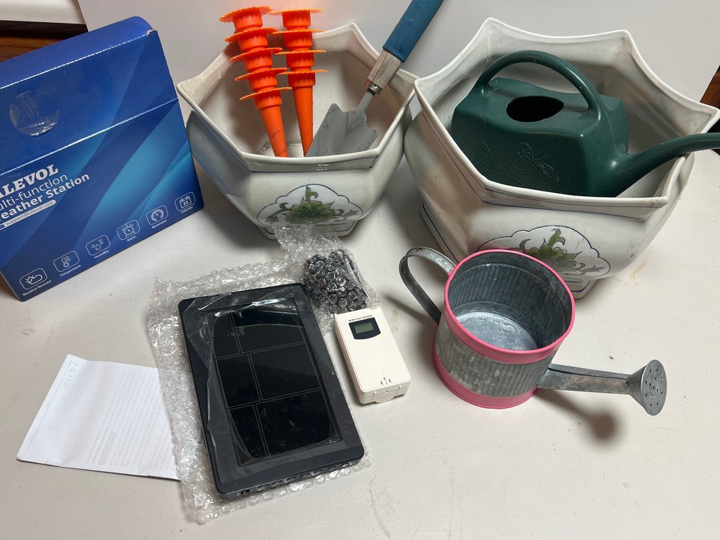 Ceramic Planters, Watering Cans, Garden Tools, and Weather Station