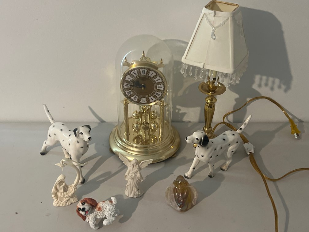 Anniversary Clock, Candlestick Table Lamp, and Figurines