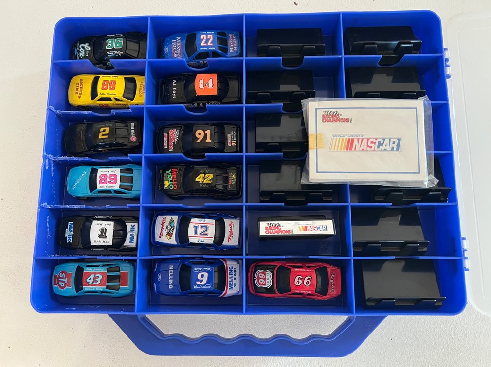 Assorted NASCAR Racing Champions 1:64 Die Cast Stock Cars in Double sided Case