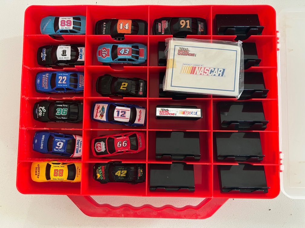 Assorted NASCAR Racing Champions 1:64 Die Cast Stock Cars in Double sided Case