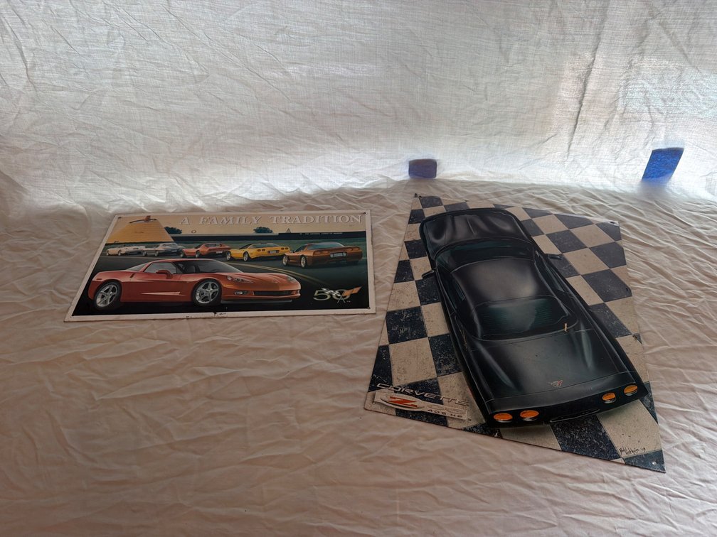 Two Chevrolet Corvette Tin Signs