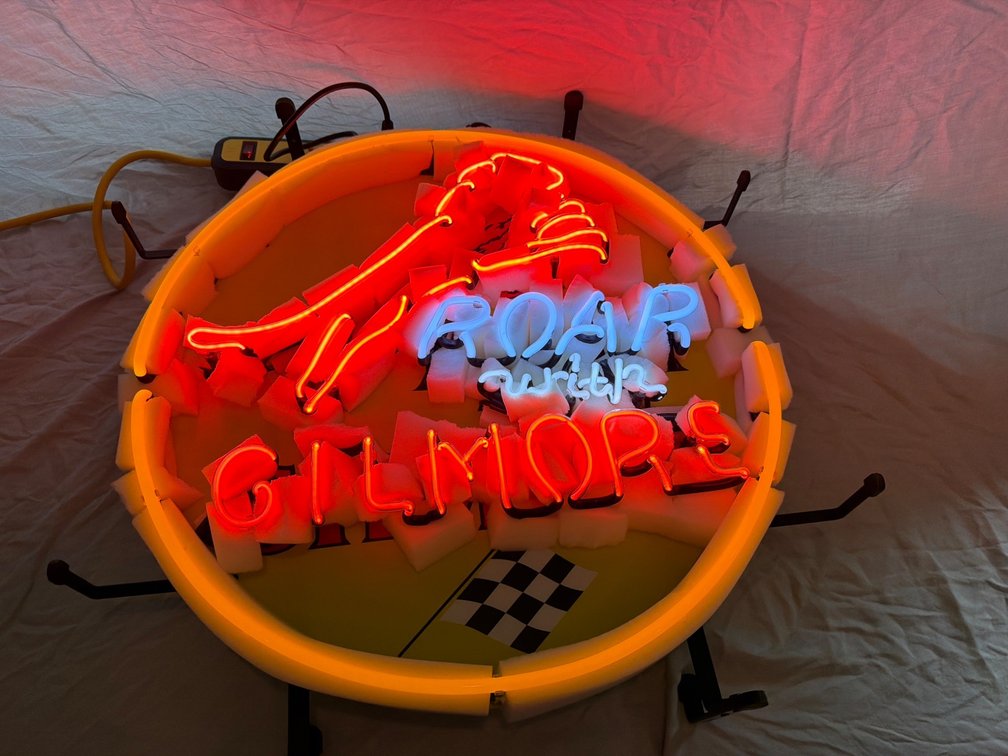 Roar with Gilmore Neon Sign on Metal Frame