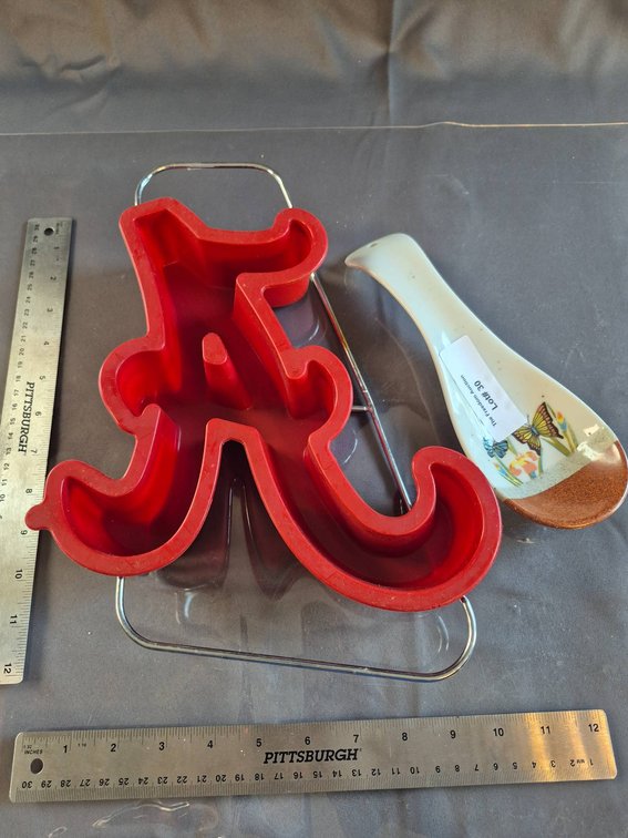Red 'A' Shaped Cake Pan and Ceramic Spoon Rest with Butterfly Design