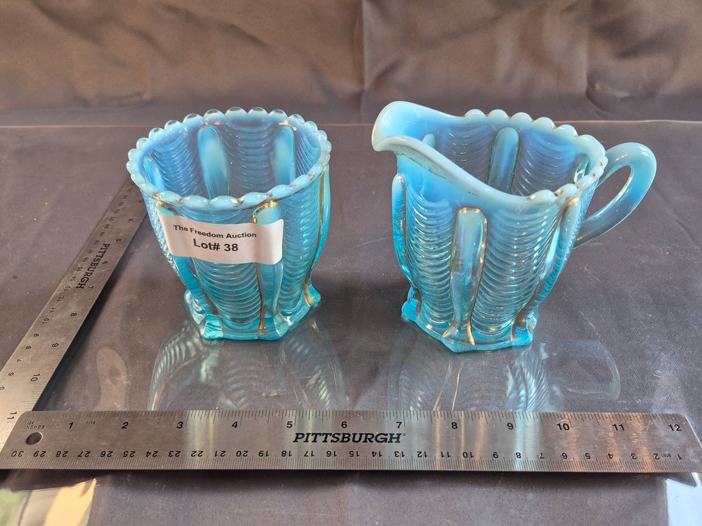 Blue Opalescent Glass Creamer and Sugar Bowl with Ribbed Patterns
