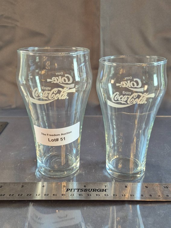 Two Coca-Cola Branded Glasses with Classic Logo Design
