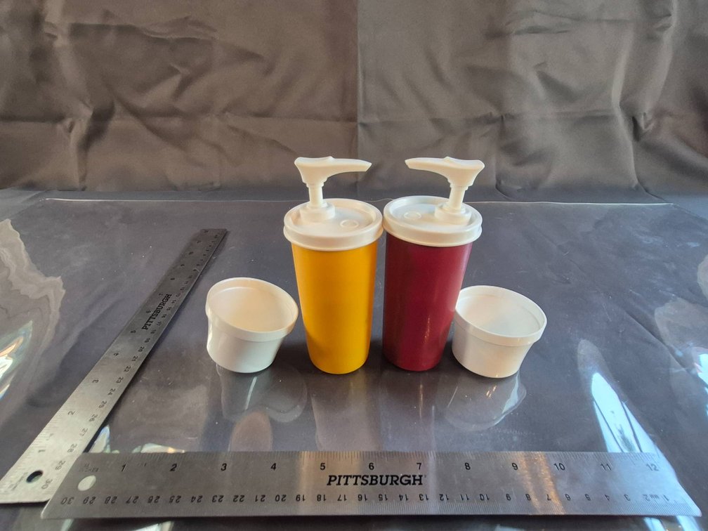 Tupperware Yellow and Red Dispensers with White Lids and Pumps