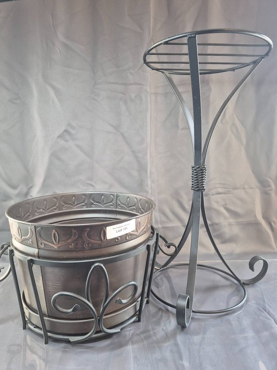Metal Planter with Stand Featuring Decorative Design