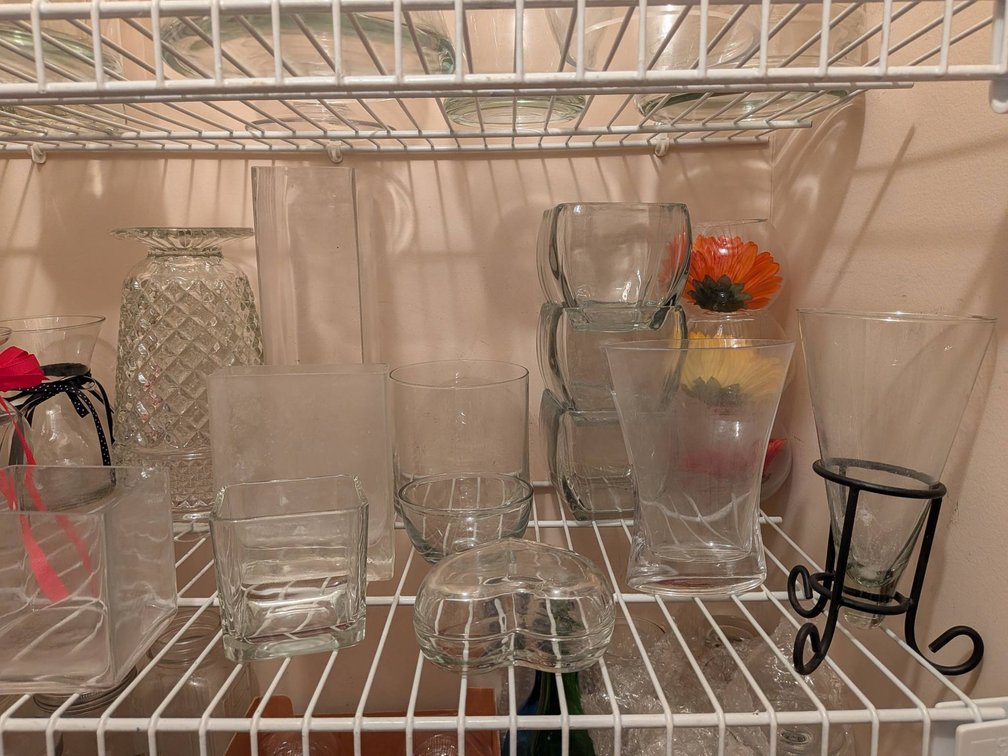 24 Glass Vases and Containers of Various Shapes and Sizes