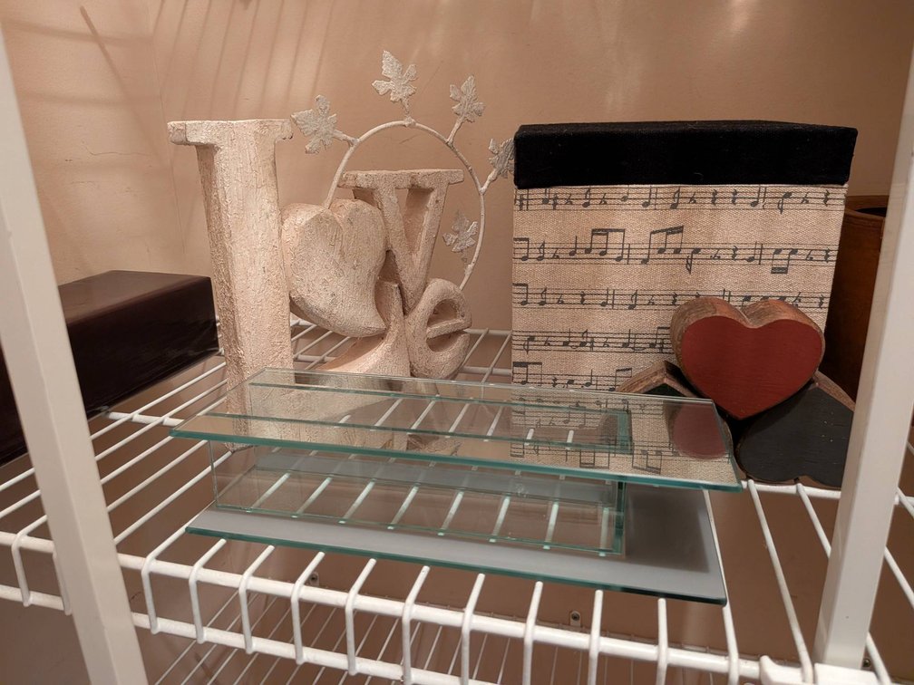 Decorative Items Including Love Sculpture and Storage Box