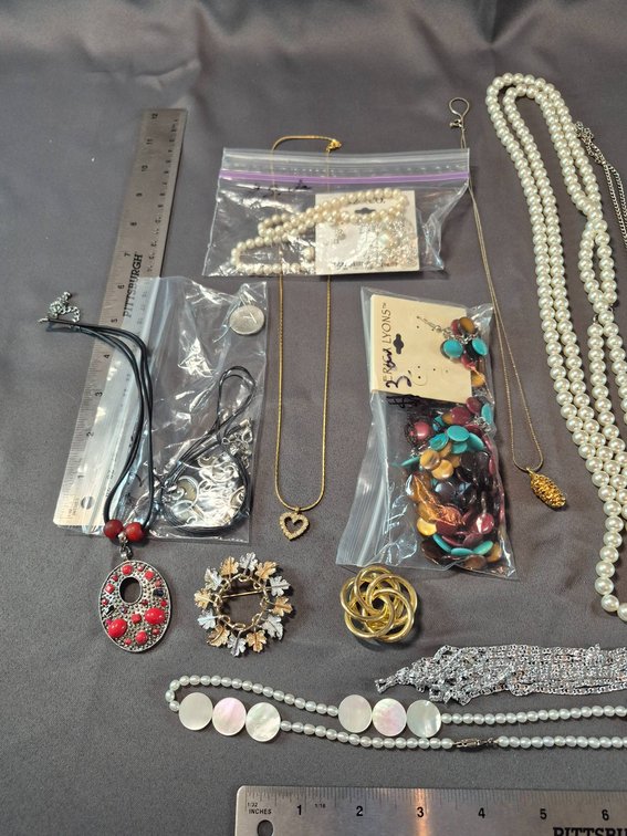 Costume Jewelry Lot with Necklaces, Brooch, and Earrings