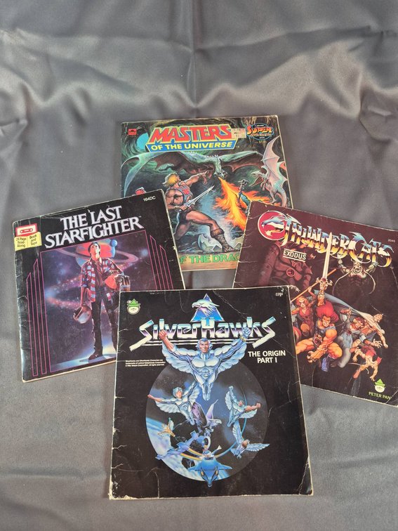 Four Vintage Storybooks Featuring Superheroes and Sci-Fi Themes