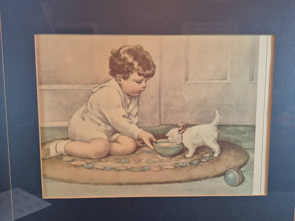 Framed Illustration of Child Feeding Dog on Rug