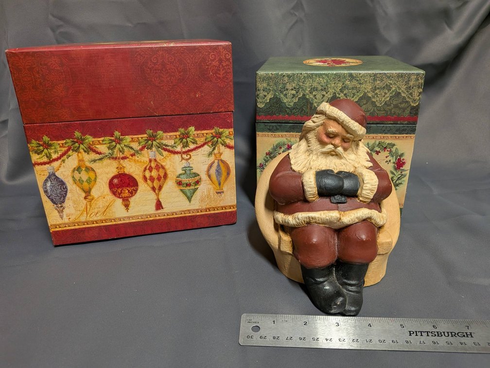 Christmas-Themed Resin Santa Figure with Decorative Boxes