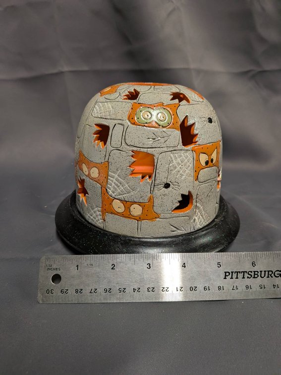 Gray Ceramic Candle Holder With Cat Cutouts and Black Base