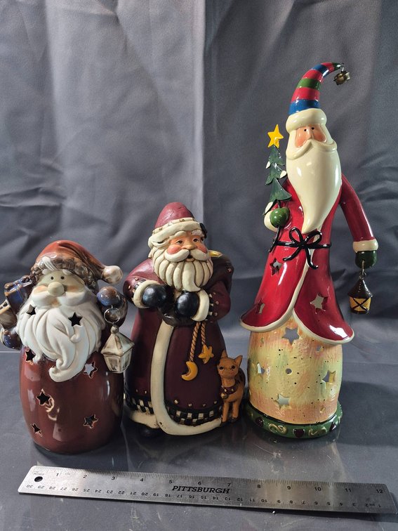 Three Ceramic Santa Claus Figures