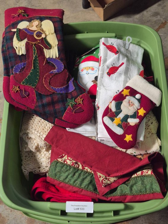Christmas Stockings, Linens, and Holiday Decor in Storage Bin