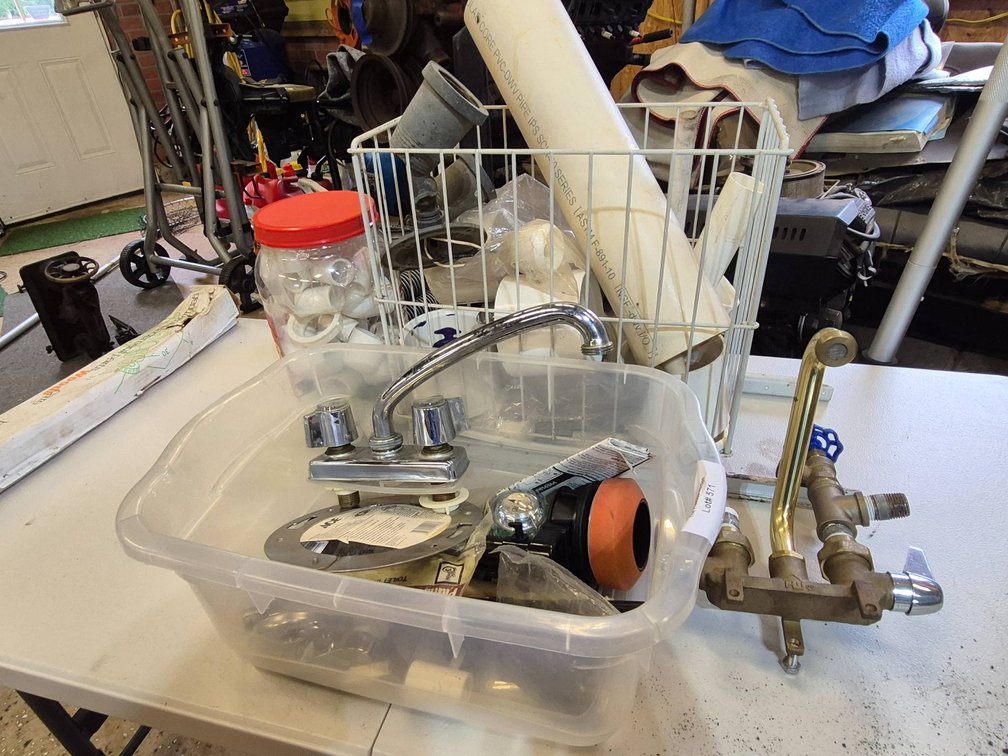 Plumbing Supplies Including Faucets, Fittings, and PVC Pipes