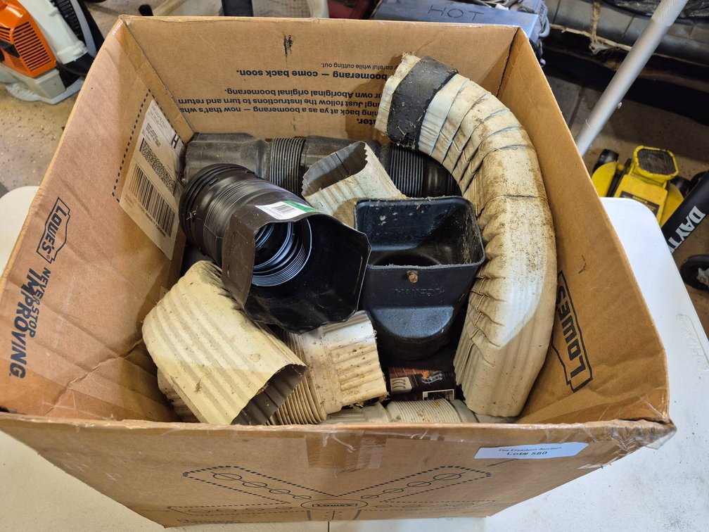 Cardboard Box Containing Assorted Drainage Pipe Fittings and Components
