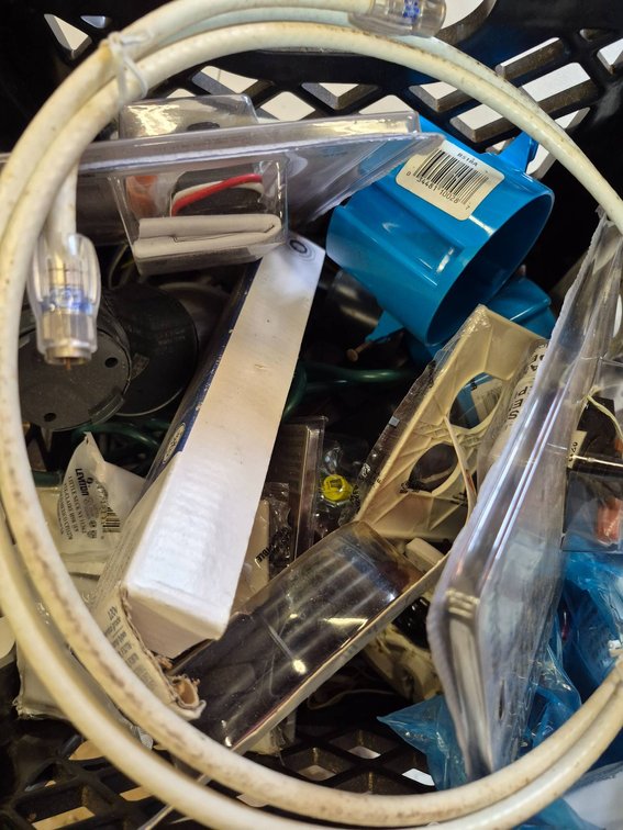 Electrical Components and Hardware in Black Crate
