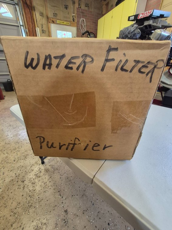 Box Labeled 'Water Filter Purifier'