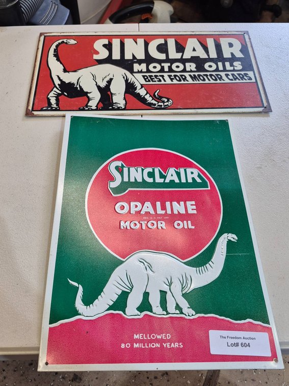 Two Sinclair Motor Oil Advertising Signs