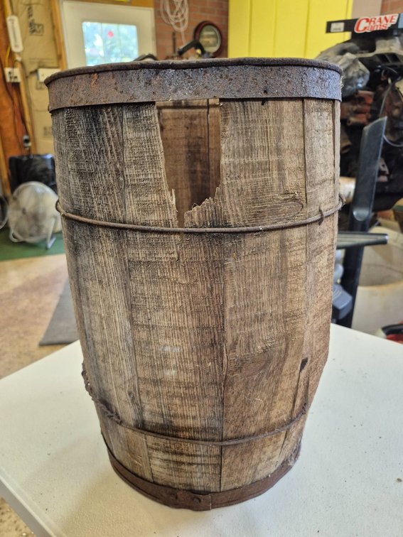 Wooden Barrel with Metal Hoops and Open Slats