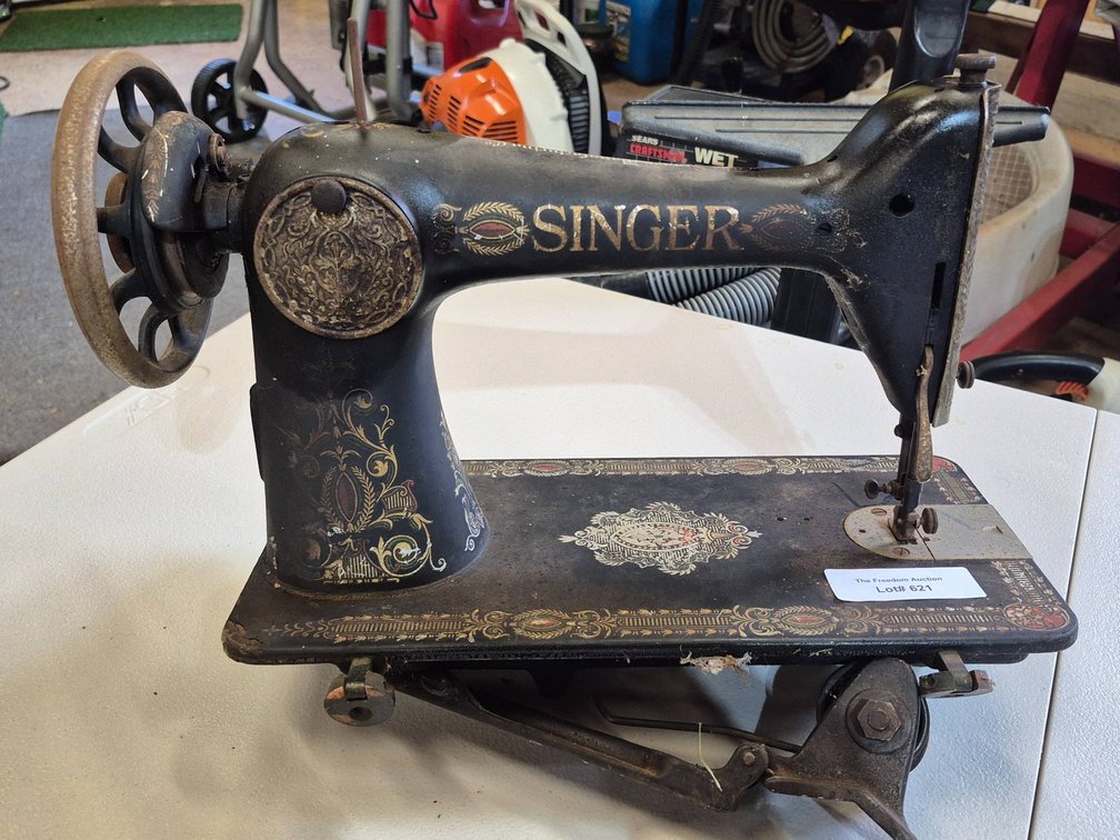 Singer Treadle Sewing Machine with Ornate Decorative Details