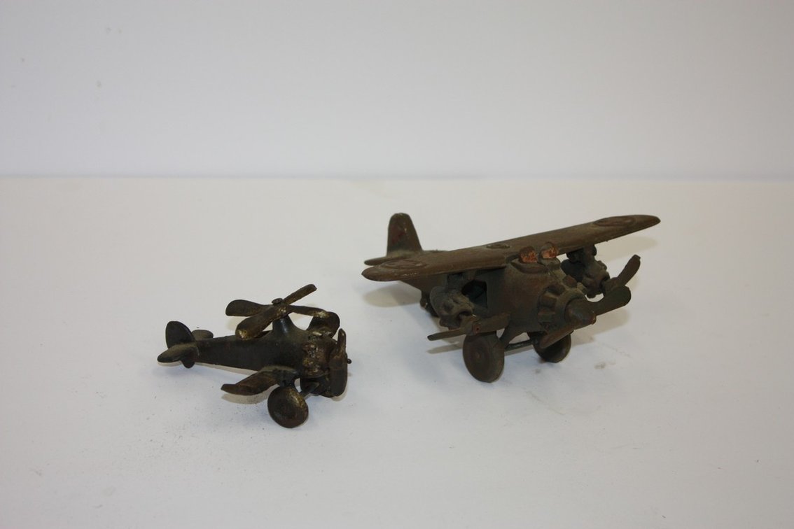 Vintage Cast-Iron U.S. Army Toy Figurine Model With Small Airplane