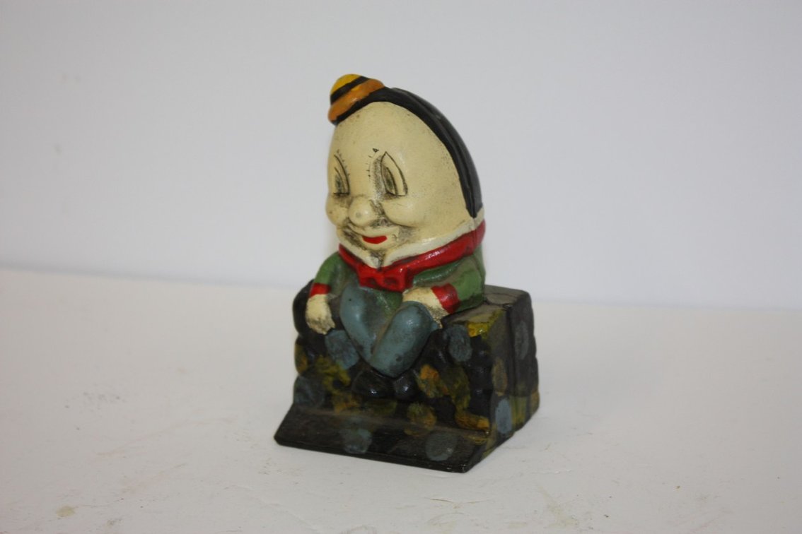 Vintage cast-iron Humpty Dumpty coin bank