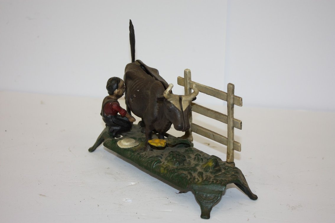 Vintage Cast-Iron Mechanical Bank “Book Of Knowledge” Kicking