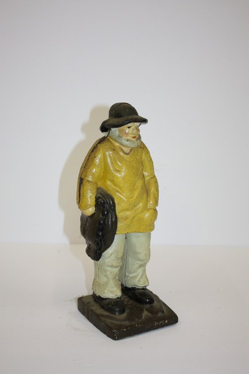 Vintage Figural “Old Salt” Fisherman Cast-Iron Doorstop