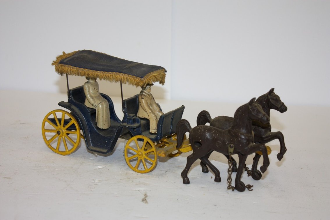 Vintage Cast-Iron Horse And Buggy With Two Passengers