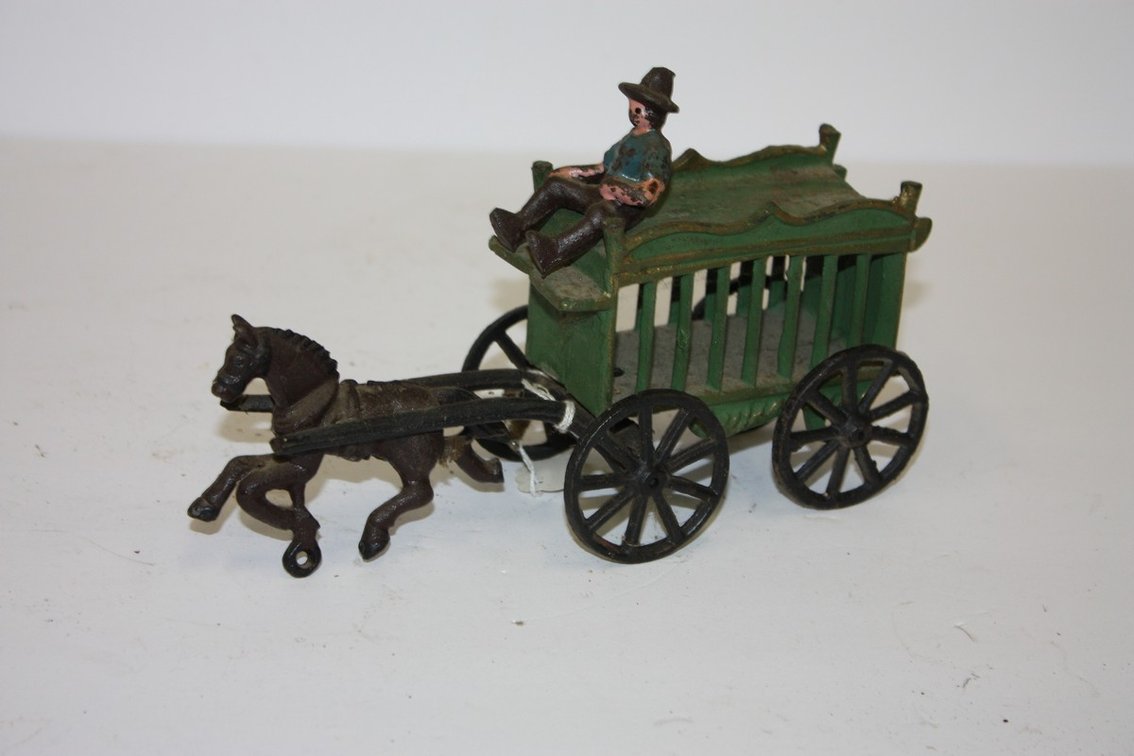 Vintage Cast-Iron Horse-Drawn Circus Wagon With Driver