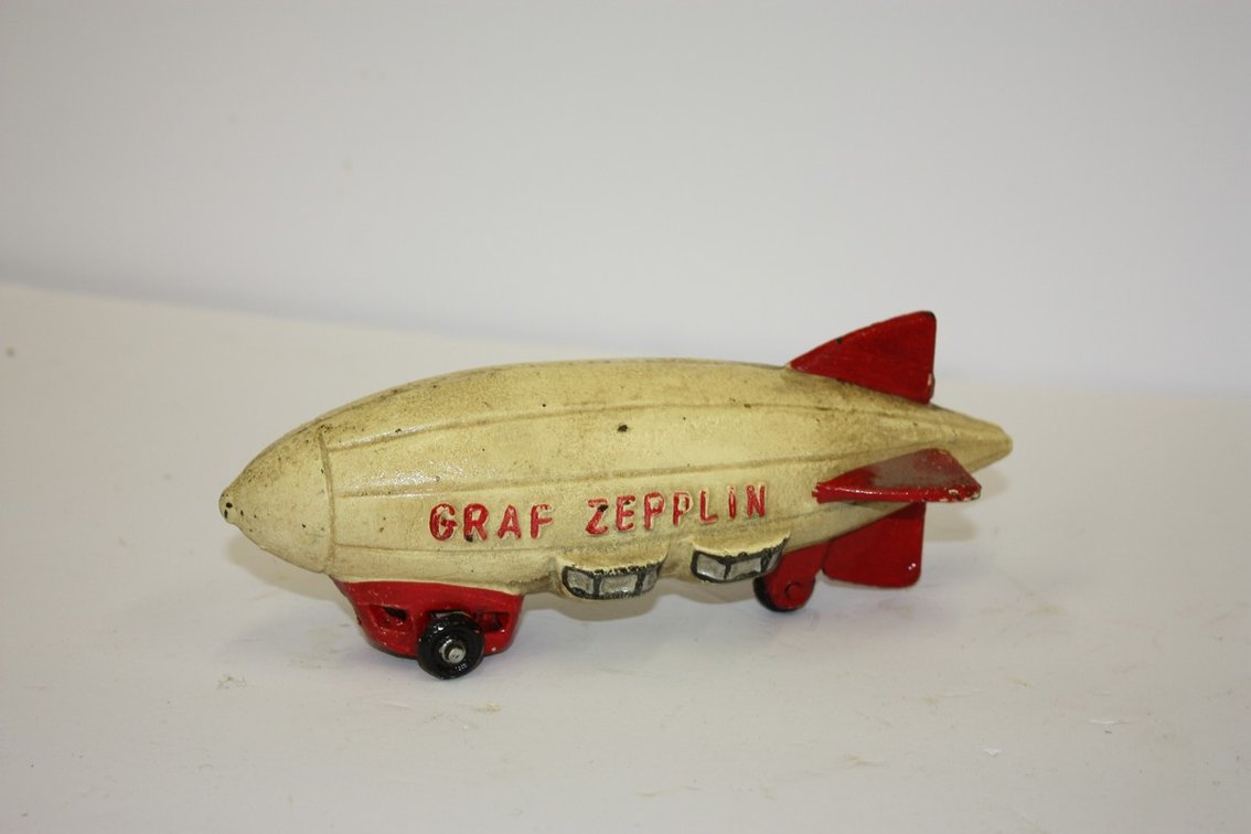 Vintage Cast-Iron Graf Zeppelin Red And White Blimp Pull Toy