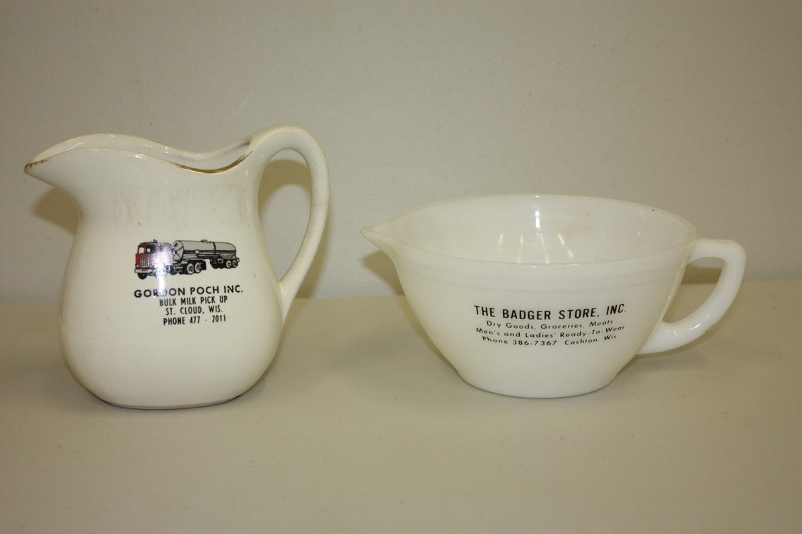 Lot of Two Vintage Advertising Pitchers, the Badger Store, and Bulk Milk Pick Up
