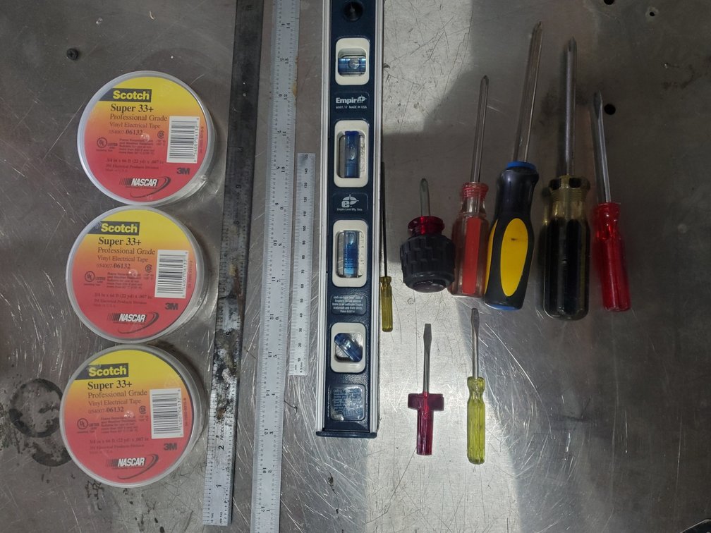 Lot 63: Level,screw drivers and new electrical tape