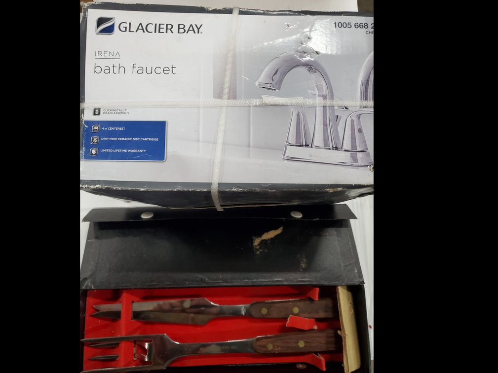 Lot 37: New bath faucet and cutlery set