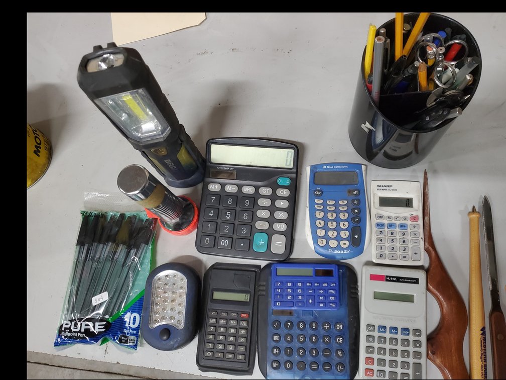 Lot 57: Office items:Calculators,pens,flashlights etc