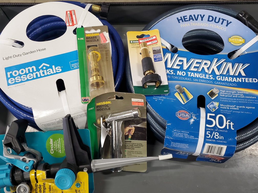 Lot 53: Garden hoses and supplies