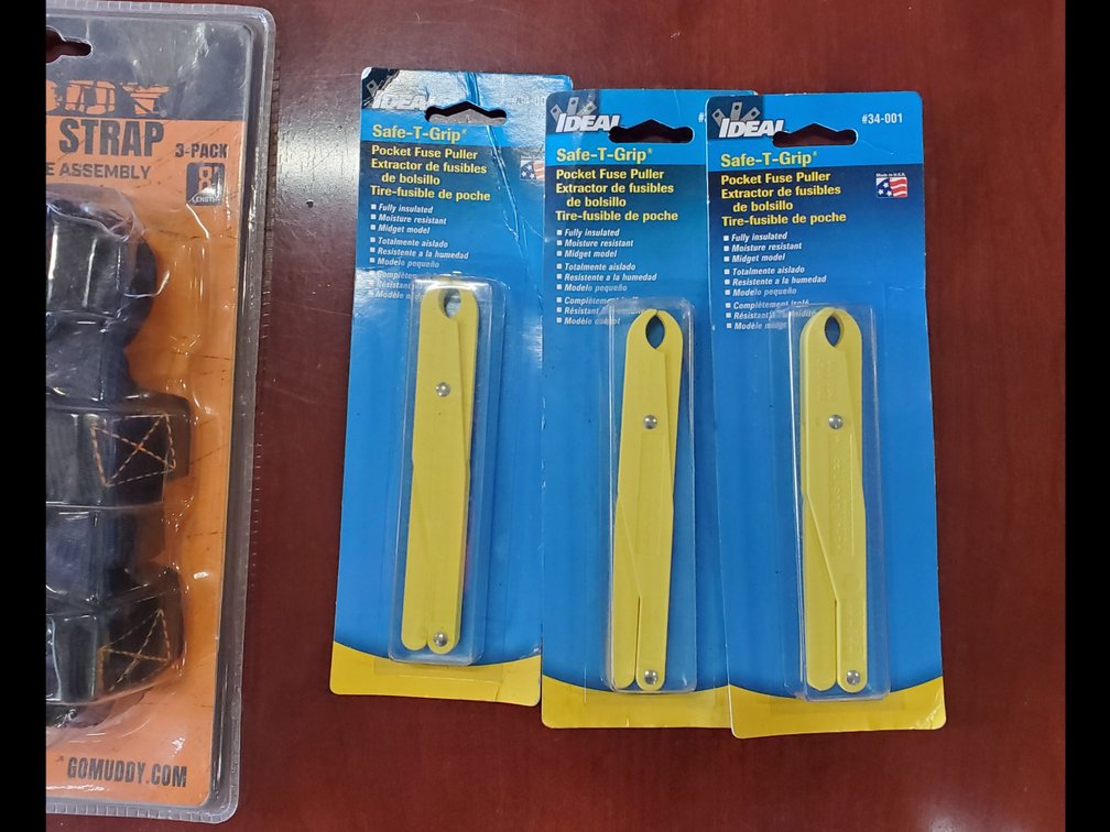 Lot 99: Tie downs and fuse pullers