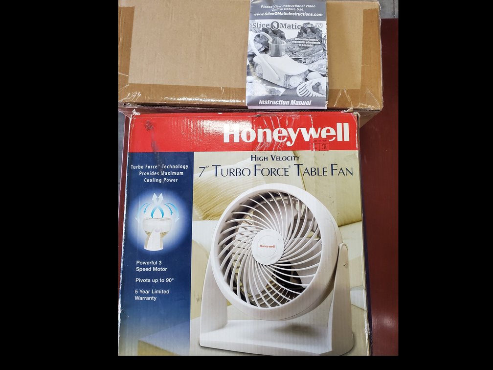 Lot 122: New in box Tabletop slicer and fan