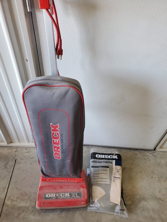 Lot 52: Oreck xl commercial vacuum with bags