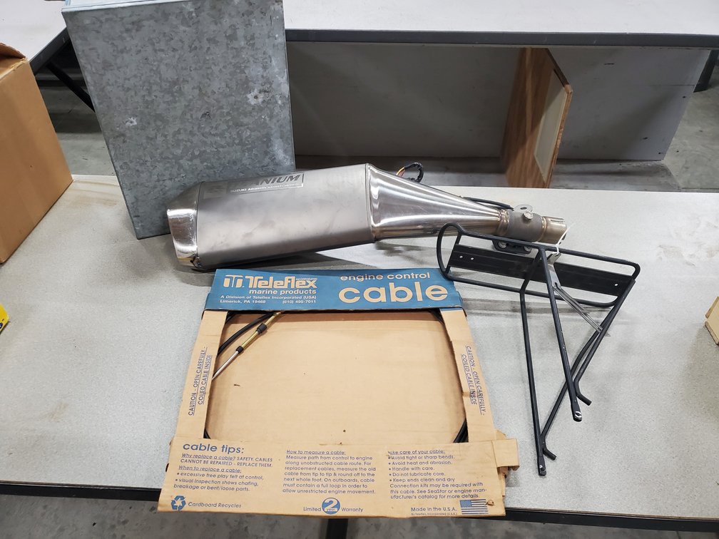 Lot 118: New throttle cable, exhaust and misc
