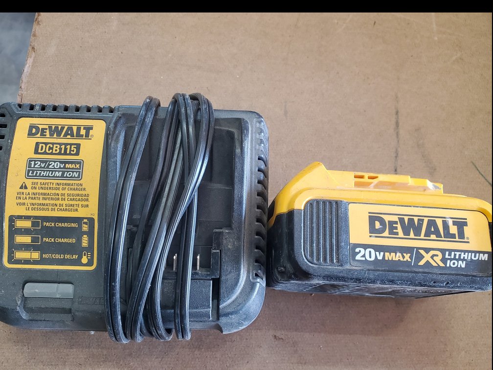 Lot 202: Dewalt 20volt battery and charger