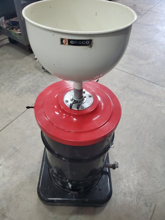 Lot 205: Graco oil catch drum